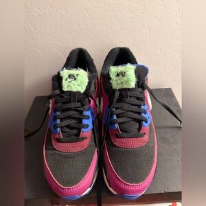 Nike Black and Pink Sneakers with Blue Accents